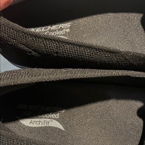 Skechers All-Black Arch Fit Slip-Ons